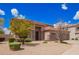 Well-maintained front yard with mature trees and desert landscaping at 2146 S Drexel --, Mesa, AZ 85209