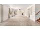 Spacious living room with neutral carpet and a fireplace at 2146 S Drexel --, Mesa, AZ 85209