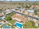 Stunning aerial view of the property featuring a sparkling pool and lush backyard, ideal for outdoor entertaining at 2315 E Cholla St, Phoenix, AZ 85028