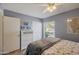 Comfortable bedroom with light gray walls, tile flooring, and a closet at 2315 E Cholla St, Phoenix, AZ 85028