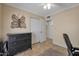 Bedroom featuring neutral-tone walls, tile flooring, and large closet at 2315 E Cholla St, Phoenix, AZ 85028