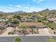 Charming single-story home featuring desert landscaping and a spacious driveway, set against a backdrop of scenic mountains at 2315 E Cholla St, Phoenix, AZ 85028