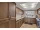 Cozy kitchen with ample cabinet space, granite countertops, and modern stainless steel appliances at 2315 E Cholla St, Phoenix, AZ 85028