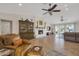 Spacious living room showcasing tile flooring, a fireplace, and views of the backyard oasis at 2315 E Cholla St, Phoenix, AZ 85028