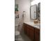Clean bathroom features modern fixtures, a white countertop, and stylish mirrors at 2401 E Rio Salado Pkwy # 1225, Tempe, AZ 85288