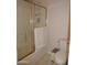 Bathroom features glass enclosed tub and toilet at 2401 E Rio Salado Pkwy # 1225, Tempe, AZ 85288
