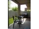 Covered patio with outdoor seating and artificial grass creating a relaxing space at 2401 E Rio Salado Pkwy # 1225, Tempe, AZ 85288