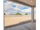 View of the expansive backyard with block fence for privacy and potential for landscaping at 24356 W La Salle St, Buckeye, AZ 85326