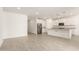 Bright, open living space with tile floors and stainless steel appliances at 24356 W La Salle St, Buckeye, AZ 85326