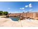 Backyard pool and spa featuring rock waterfall feature at 2528 N Ashbrook Cir, Mesa, AZ 85213