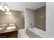 Modern bathroom with double sinks, a soaking tub, and contemporary tile at 33 W Missouri Ave # 17, Phoenix, AZ 85013