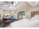 Bright bedroom with white furniture, hardwood floors, and serene decor at 33 W Missouri Ave # 17, Phoenix, AZ 85013