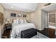 Comfortable bedroom with a bed, modern decor and an adjacent bathroom at 33 W Missouri Ave # 17, Phoenix, AZ 85013
