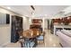 Open-concept living space with dining area, kitchen, and comfortable seating at 33 W Missouri Ave # 17, Phoenix, AZ 85013