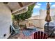 Outdoor patio featuring an umbrella, seating and colorful chairs at 33 W Missouri Ave # 17, Phoenix, AZ 85013