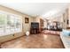 Living room with tile floors, plantation shutters and open layout to dining area for entertaining at 3308 N Nebraska St, Chandler, AZ 85225