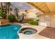 Backyard with a pool and spa plus a sports court offering entertainment and relaxation at 3308 N Nebraska St, Chandler, AZ 85225