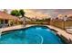 Backyard pool features an updated patio area, lounge chairs, desert landscaping, and privacy fence at 3308 N Nebraska St, Chandler, AZ 85225