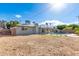 Backyard with sparkling pool and desert landscaping at 3502 W Gardenia Ave, Phoenix, AZ 85051