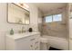 Updated bathroom with marble countertops, fresh white cabinets and updated backsplash at 3502 W Gardenia Ave, Phoenix, AZ 85051