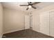 Bedroom with new carpet and closet doors for easy storage at 3502 W Gardenia Ave, Phoenix, AZ 85051