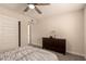 Bedroom featuring closet, dresser and neutral tones at 3502 W Gardenia Ave, Phoenix, AZ 85051