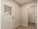 Entryway with view of the side entrance and a second room at 3502 W Gardenia Ave, Phoenix, AZ 85051
