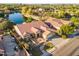 Aerial view of home with tile roof, mature landscaping, and a spacious driveway at 3750 E Sawtooth Dr, Chandler, AZ 85249