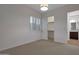 Neutral bedroom with walk-in closet, window with blinds, and ensuite bathroom access at 3750 E Sawtooth Dr, Chandler, AZ 85249