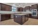 Kitchen featuring stainless steel appliances, granite countertops and a center island at 3750 E Sawtooth Dr, Chandler, AZ 85249