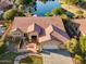 Scenic lake view from the backyard, featuring lush greenery and a tranquil atmosphere at 3750 E Sawtooth Dr, Chandler, AZ 85249