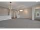 Bright and open living area with modern light fixtures at 3750 E Sawtooth Dr, Chandler, AZ 85249