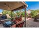 Outdoor patio boasts comfortable seating and backyard views for relaxation and entertaining at 4128 E Coolbrook Ave, Phoenix, AZ 85032
