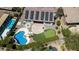 Aerial view of a private backyard with a pool, putting green, patio, and solar panels at 41817 N Bridlewood Way, Phoenix, AZ 85086
