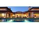 Luxury home with an inviting backyard pool and lush landscaping for serene outdoor living at 41817 N Bridlewood Way, Phoenix, AZ 85086