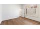 Empty bedroom with hardwood floors and plantation shutters for natural light at 41817 N Bridlewood Way, Phoenix, AZ 85086