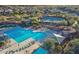 Community amenities include a large pool, shaded lounging areas, and a tennis court at 41817 N Bridlewood Way, Phoenix, AZ 85086