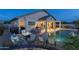 Enjoy the pool, fire pit and outdoor dining on the back patio at 4632 S Alamos Way, Gold Canyon, AZ 85118