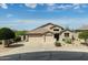 Charming single-Gathering home with a three-car garage and desert landscaping at 4632 S Alamos Way, Gold Canyon, AZ 85118