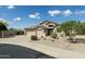 Charming single-story home with a three-car garage and low-maintenance desert landscaping at 4632 S Alamos Way, Gold Canyon, AZ 85118