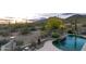 Mountain views abound from the outdoor patio and waterfall pool at 4632 S Alamos Way, Gold Canyon, AZ 85118