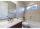 Bathroom featuring a tub/shower combo, toilet and vanity at 4894 E Palm Beach Dr, Chandler, AZ 85249