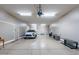 Spacious garage featuring epoxy flooring, recessed lighting, and ample storage space at 4894 E Palm Beach Dr, Chandler, AZ 85249
