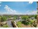 Scenic aerial view of the property, showcasing the community layout, green spaces, and surrounding landscape at 5350 E Deer Valley Dr # 2435, Phoenix, AZ 85054