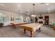 Spacious billiards room with pool tables, comfortable seating, and natural light at 5350 E Deer Valley Dr # 2435, Phoenix, AZ 85054