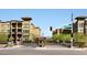 Community entrance featuring a gated entry, lush landscaping, and well-maintained architecture at 5350 E Deer Valley Dr # 2435, Phoenix, AZ 85054