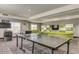 Fun game room with ping pong table, foosball, and comfortable seating for relaxing at 5350 E Deer Valley Dr # 2435, Phoenix, AZ 85054