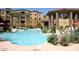 Gorgeous pool area with lush landscaping and lounge chairs for relaxation at 5350 E Deer Valley Dr # 2435, Phoenix, AZ 85054