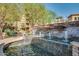 Community water feature with natural stone and flowing water at 5350 E Deer Valley Dr # 2435, Phoenix, AZ 85054