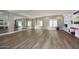 Bright yoga studio featuring wood floors, mirrored wall, and storage for equipment at 5350 E Deer Valley Dr # 2435, Phoenix, AZ 85054